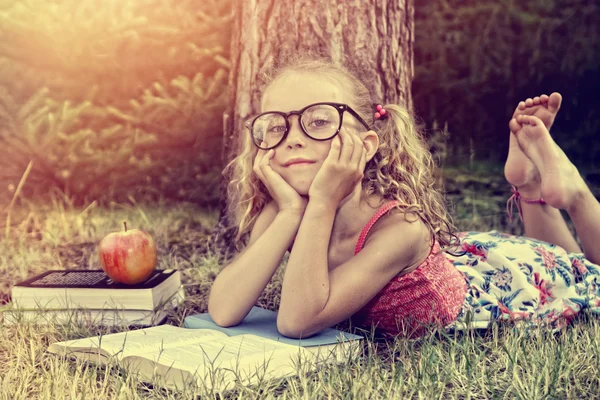 Vintage young girl with book — Stock Photo, Image
