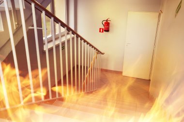 Fire in the builgding - evacuate building way clipart