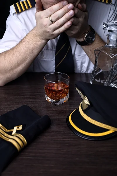 Desperate and plunged pilot drink alcohol — Stock Photo, Image