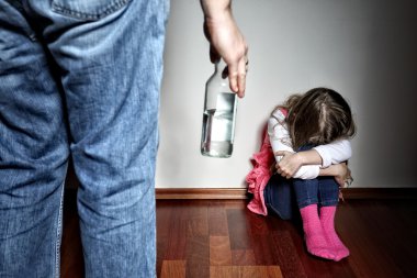 Father with belt stands above the frightened daughter clipart