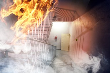 Fire in the building - emergency exit clipart