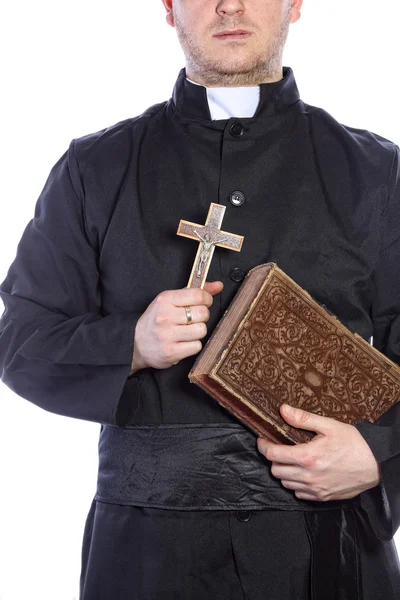 Priest holding a cross and bibles — Stock Photo, Image