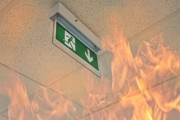 Emergency exit - fire in the office — Stock Photo, Image