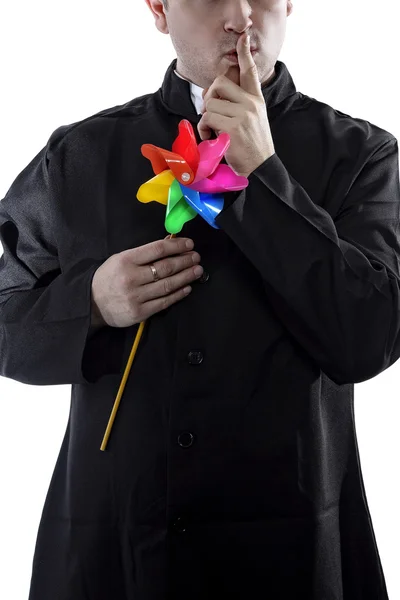 Priest with a colored heat sink opaque mystery — Stock Photo, Image