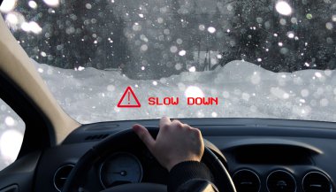 Technology displays a warning on windshield about the bad conditions of the road clipart