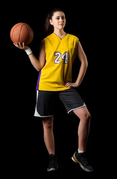 Fiatal lány kosárlabda játékos — Stock Fotó