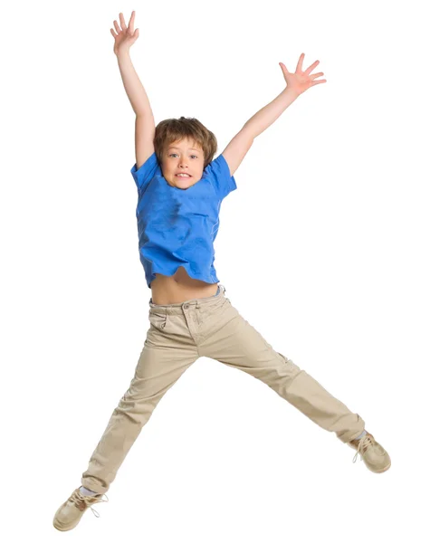 Saltando menino pequeno isolado — Fotografia de Stock