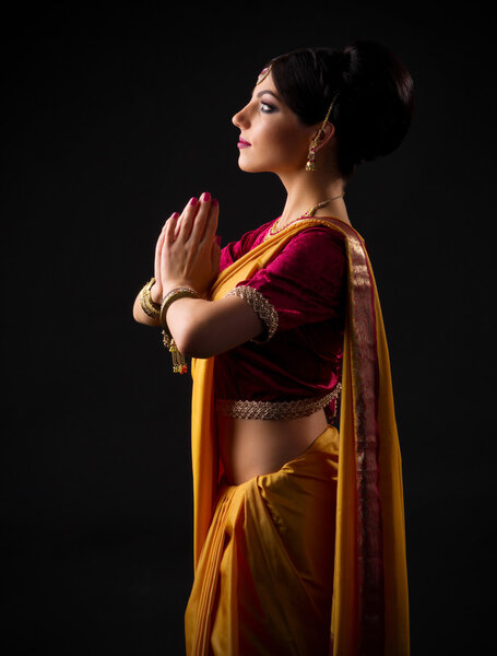 Indian woman on grey