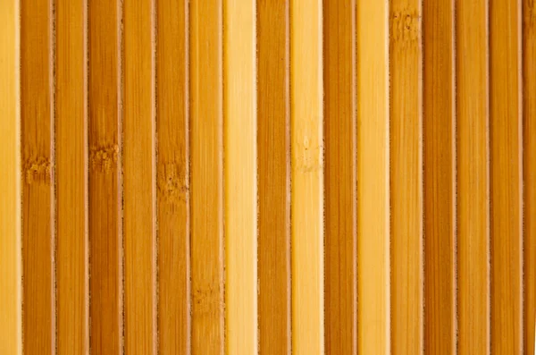 Guardanapo de bambu luz fundo amarelo — Fotografia de Stock