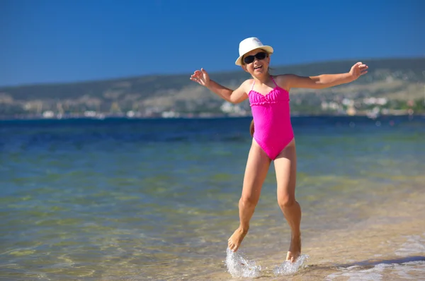 Girl on sea coast — Stok fotoğraf