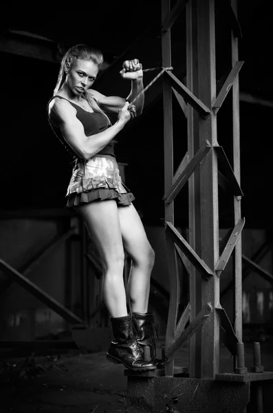 Woman in uniform with skipping rope(monochrome version) — Stock Photo, Image