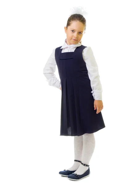 Beautiful little girl in school uniform isolated on white — Stock Photo ...