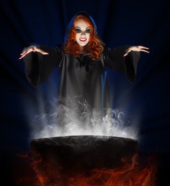Witch with cauldron on blue rays background clipart