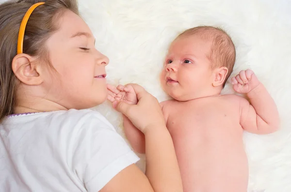 Baby with her sister — Stock Photo, Image