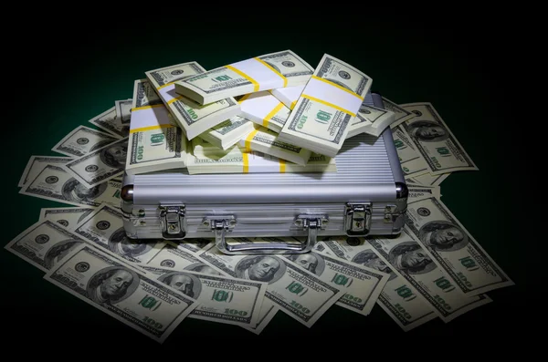 Dollars with metallic case — Stock Photo, Image