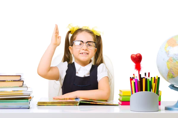 Schoolgirl at the table — Stock Photo, Image