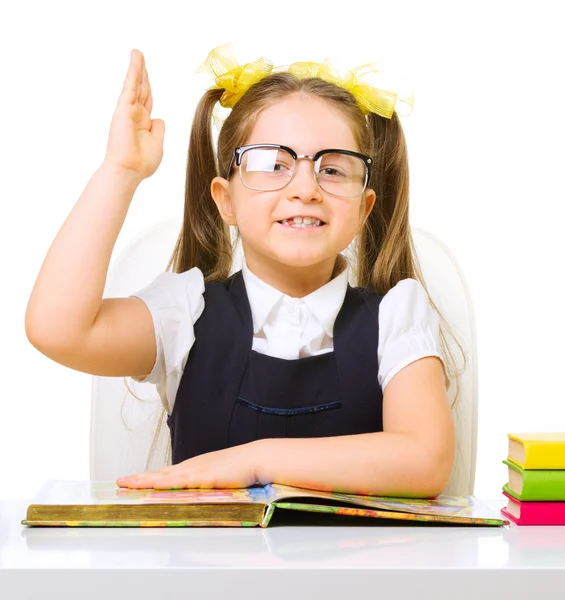 Schoolgirl at the table — Stock Photo, Image