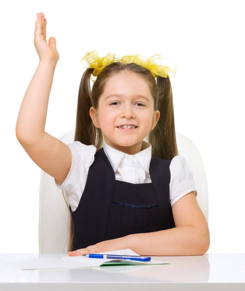 Schoolgirl at her desk — Stock Photo, Image