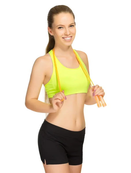 Young sporty girl with skipping rope — Stock Photo, Image