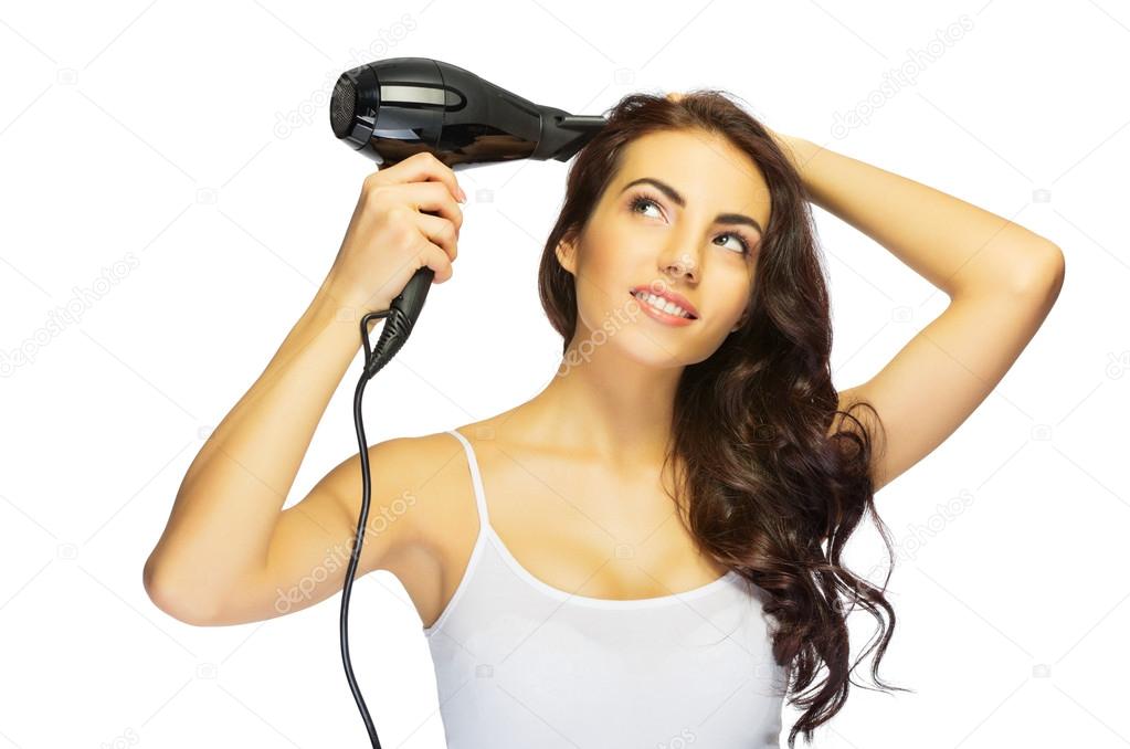 Young healthy girl with hair dryer