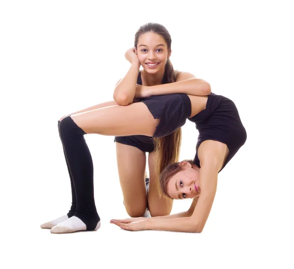 Dos chicas dedicadas gimnasia de arte — Foto de Stock