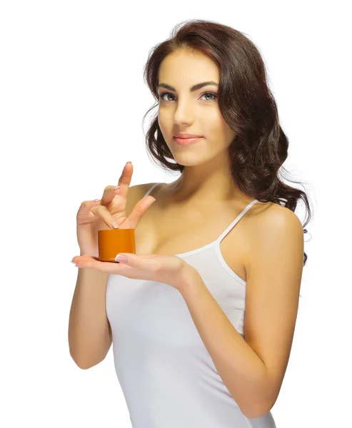 Young girl with body cream — Stock Photo, Image