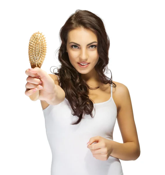 Young girl with hair brush — Stock Photo, Image