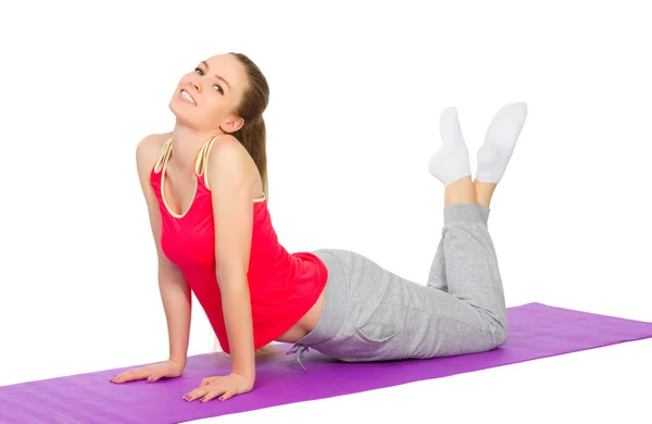 Sporty girl doing gymnastic exercises — Stock Photo, Image