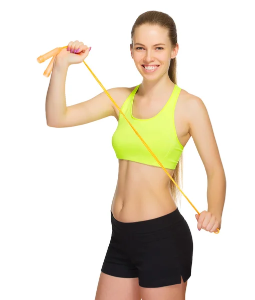 Sporty girl with skipping rope — Stock Photo, Image