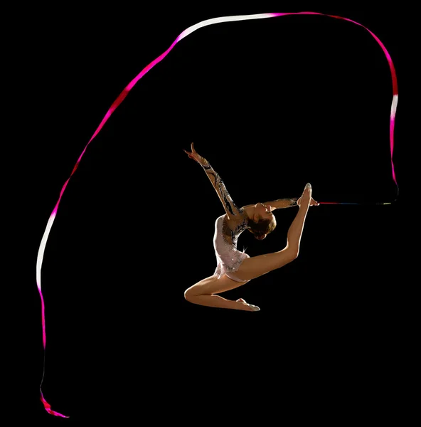 Dívka se zabývá umělecké gymnastiky — Stock fotografie
