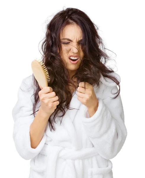 Displeased girl with tangled hair — Stock Photo, Image