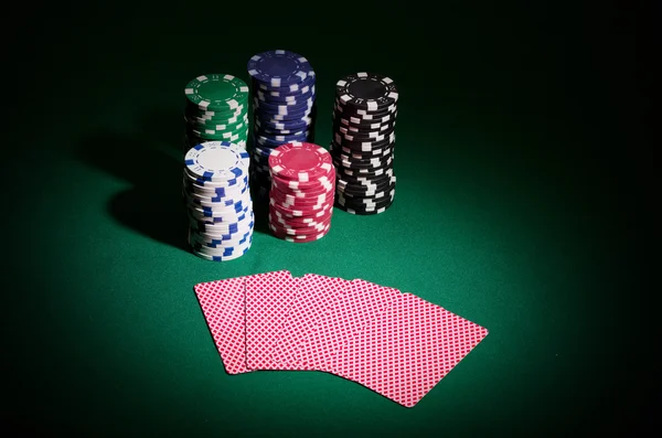 Gambling chips and playing cards Royalty Free Stock Images