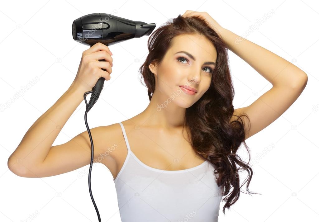 Young girl with hair dryer