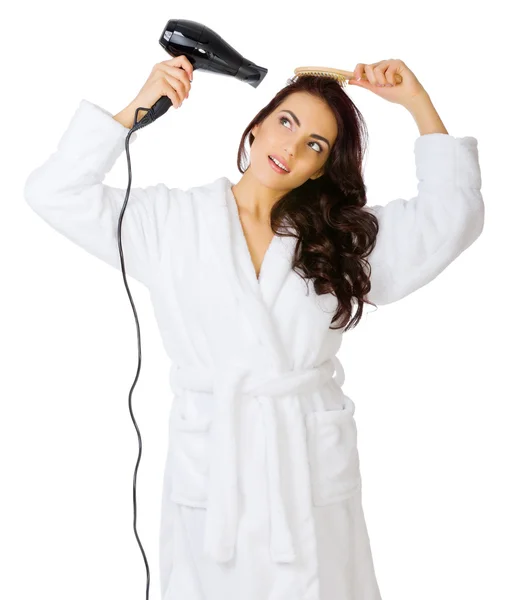 Healthy girl in bathrobe with hair dryer — Stock Photo, Image