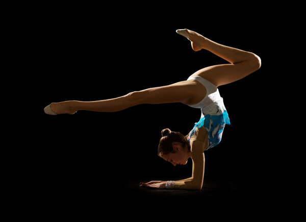 Young girl engaged art gymnastic