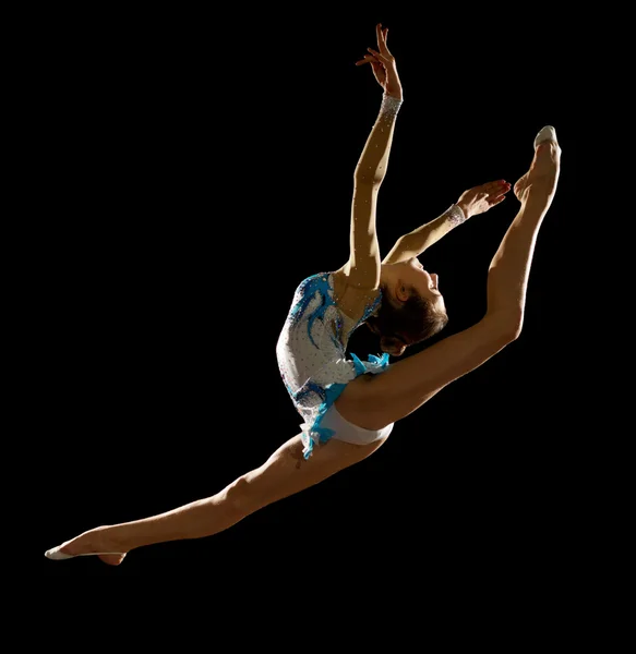Девушка занимается художественной гимнастикой — стоковое фото