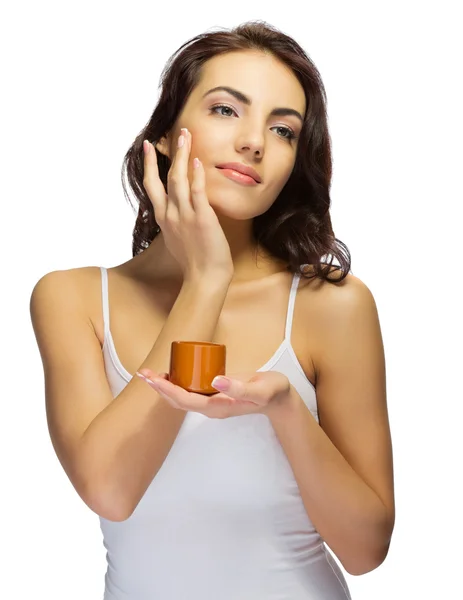 Young girl with body cream — Stock Photo, Image