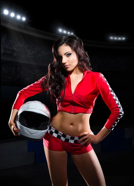 Girl racer with helmet at stadium — Stock Photo, Image