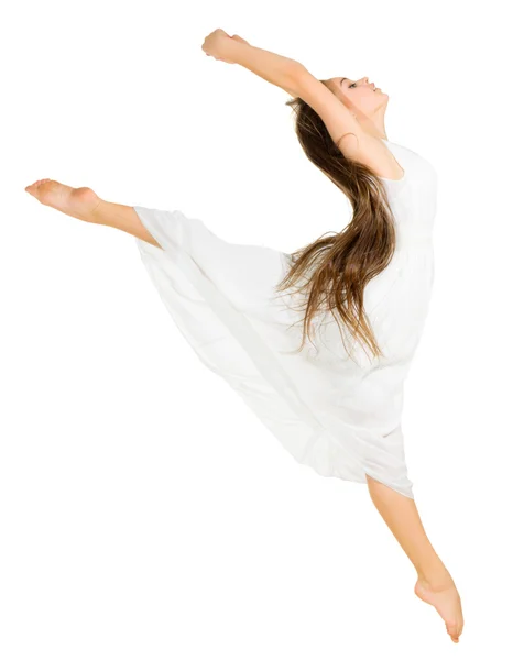穿白色连衣裙的年轻跳舞的女孩 — 图库照片