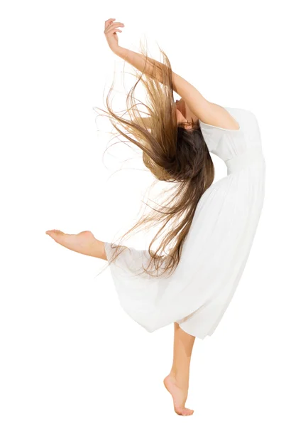 Unga dansande flicka i vit klänning — Stockfoto