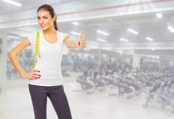 Sporty girl at fitness club — Stock Photo, Image