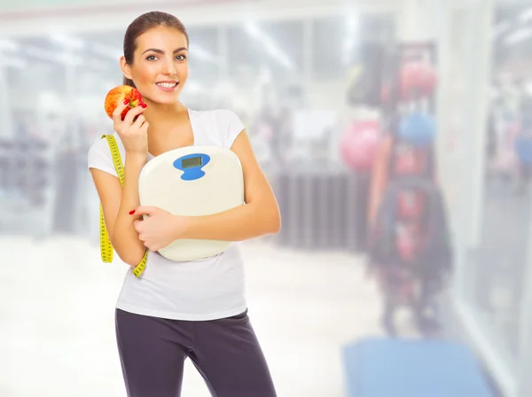 Sporty girl at fitness club — Stock Photo, Image