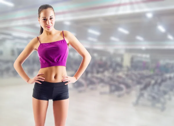 Sporty girl at fitness club — Stock Photo, Image