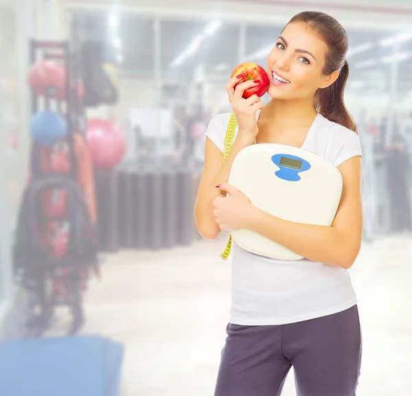 Sporty girl at fitness club — Stock Photo, Image