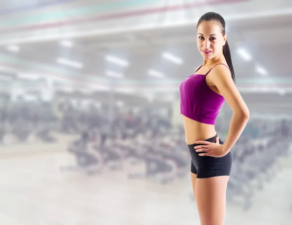 Sporty girl at fitness club — Stock Photo, Image