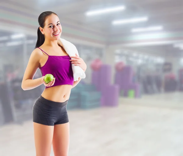 Sporty girl at fitness club — Stock Photo, Image