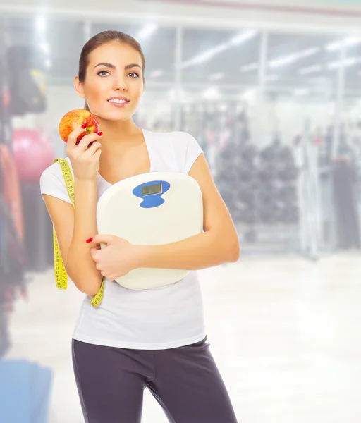 Sporty girl at fitness club — Stock Photo, Image