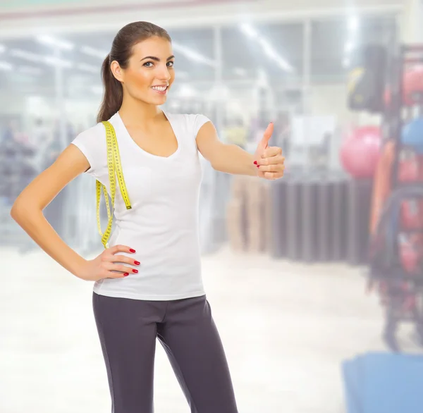 Young girl at fitness club — Stock Photo, Image