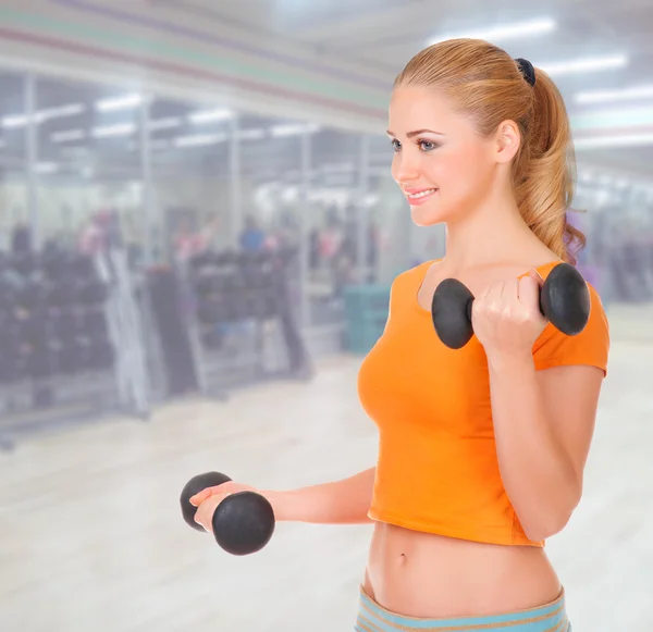 Young woman at fitness club — Stock Photo, Image