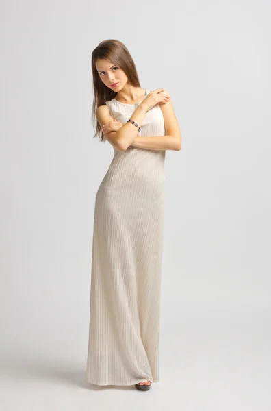 Young woman in long dress — Stock Photo, Image